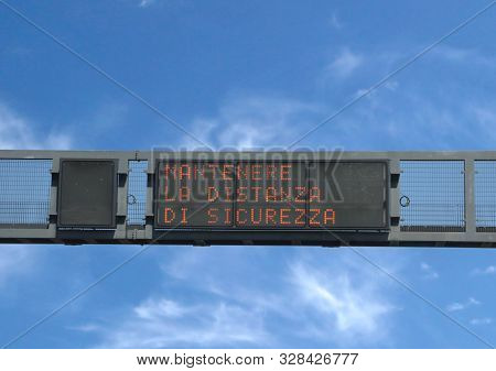 Electronic Traffic Sign With Text Mantenere La Distanza Di Sicurezza That Means Keep A Safe Distance