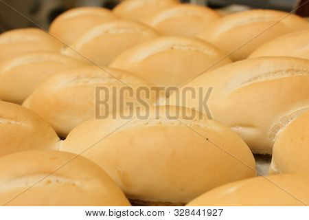 Tray Full Of Bread Fresh From The Oven