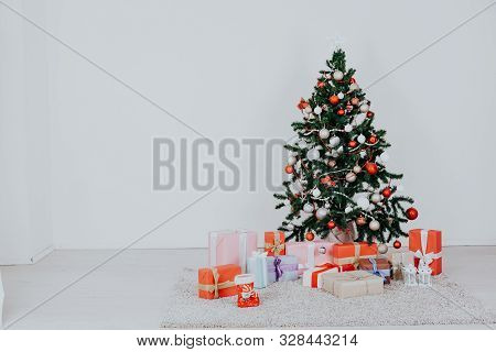 Christmas Tree With Presents On A White Background For The New Year