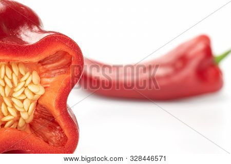 Group Of One Whole One Half Of Sweet Red Bell Pepper Isolated On White Background