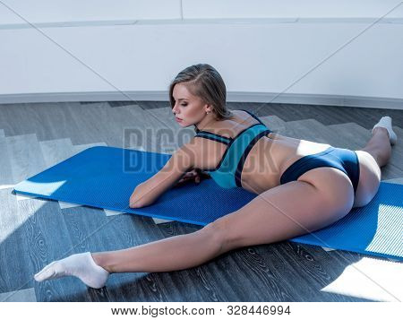 Sexy Girl With Perfect Body Posing In Fitness Room