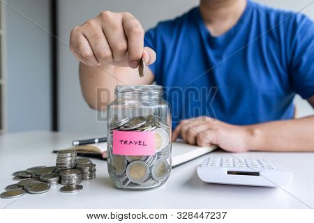 Man Putting Coins To Planning Growing Saving To Strategy With Money Box For Future Plan Fund Of Trav