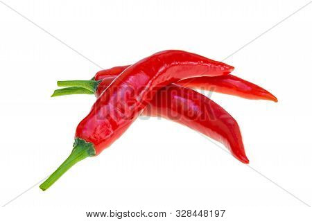Close Up Red Hot Chili Spur Pepper At White Background