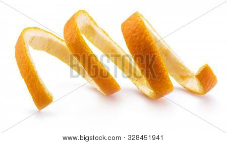Orange peel or orange twist on white background. Close-up.