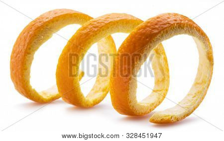 Orange peel or orange twist on white background. Close-up.