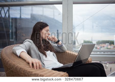 Stress At Work, Deadline And Lack Of Time. Business Problems. A Young Woman In Business Clothes Sitt