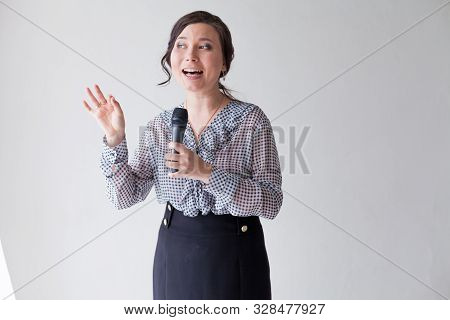 Asian Woman Talks Into Microphone Sings Nice