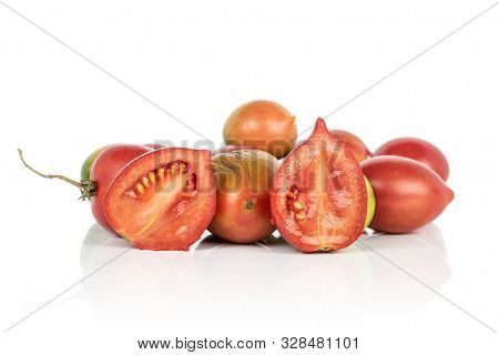 Group Of Lot Of Whole Two Halves Of Fresh Tomato De Barao Isolated On White Background