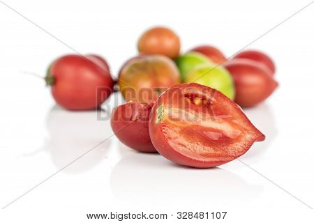 Group Of Lot Of Whole Two Halves Of Fresh Tomato De Barao Isolated On White Background