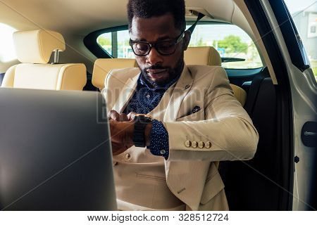 Business Afro Male Useing Phone Route Novator Map App Sitting In Car
