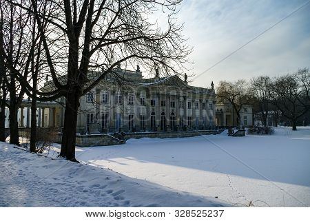 The Lazienki Palace In Lazienki Park. Winter Landscape With Snow. Warsaw. Lazienki Krolewskie, Polan