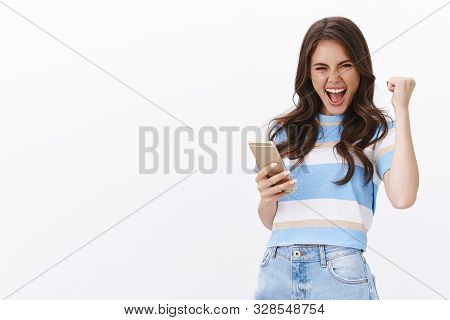 Excited Joyful Lucky Girl Extremely Happy Win Bit Boyfriend Score, Fist Pump And Smiling Shouting Ho