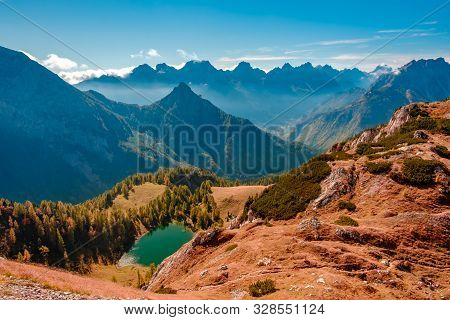 The Bordaglia Lake In A Colorful Autumn Day