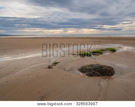 Stones On The Shore Of The North Sea In Brora