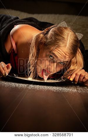 Girl In Lingerie Laps Milk From Bowl On Floor