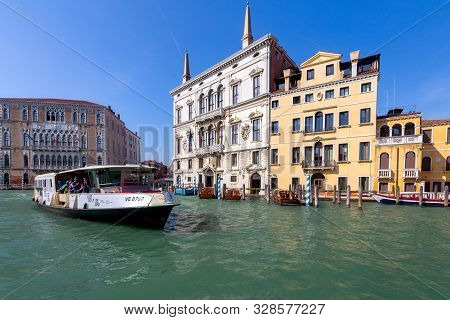 Venice, Italy - September 30, 2019: Vaparetto Passenger Boats On The Grand Canal On A Sunny Day.