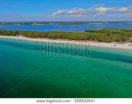 Aerial View Of Coquina Beach White Sand Beach And Turquoise Water In Bradenton Beach During Blue Sum