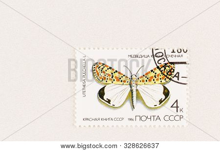 Seattle Washington - October 5, 2019: Close Up Of Cto Russian Postage Stamp With Crimson Speckled Mo