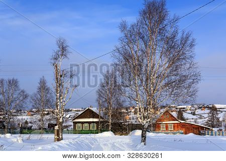 Russian Village In Winter. View Of The Russian Tradtional Country Houses. Village Of Visim, Sverdlov