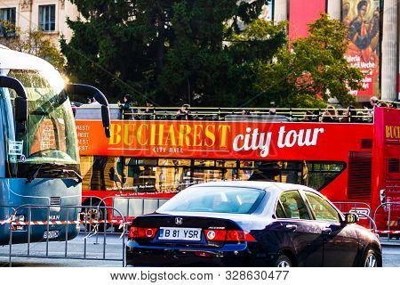 Car Traffic At Rush Hour In Downtown Area, Victoriei Boulevard (calea Victoriei) In Bucharest, Roman