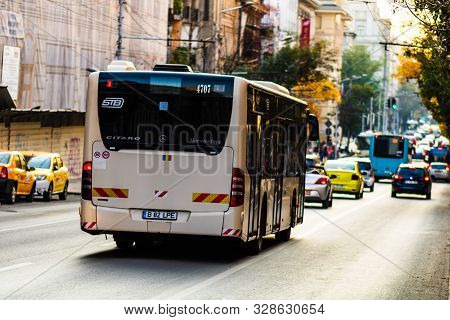 Car Traffic At Rush Hour In Downtown Area, Victoriei Boulevard (calea Victoriei) In Bucharest, Roman