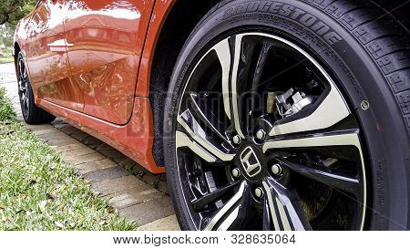 Sydney, Australia - Aug 6, 2016: Close-up Low Angle View Of The Back Wheel Of A 10th Generation Hond