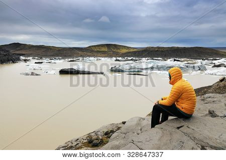 Tourist admiring the Skaftafell National Park Iceland, Europe
