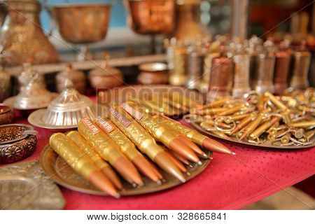 Close-up On Bullet Pens In Kazandziluk Street, The Famous Coppersmith Trading Place Located In Basca