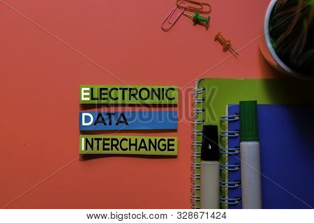 Edi. Electronic Data Interchange Acronym On Sticky Notes. Office Desk Background
