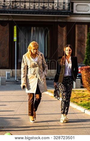 Tourists Walking On The Sidewalk Of Victoriei Way (calea Victoriei) In Bucharest, Romania, 2019
