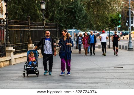 Tourists Walking On The Sidewalk Of Victoriei Way (calea Victoriei) In Bucharest, Romania, 2019