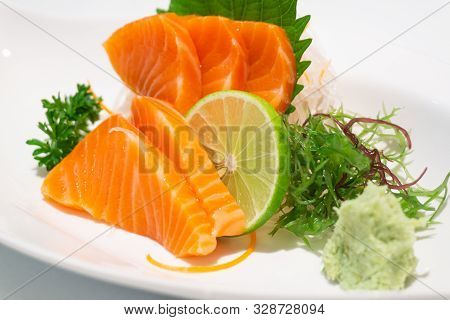 Premium Salmon Sashimi Slice On A White Plate,japanese Food