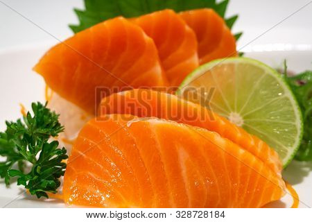 Premium Salmon Sashimi Slice On A White Plate,japanese Food