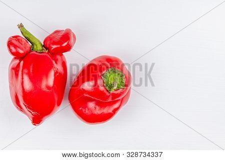 Trendy Ugly Organic Farm Vegetables - Sweet Bell Peppers With Mutations On White Background. Concept