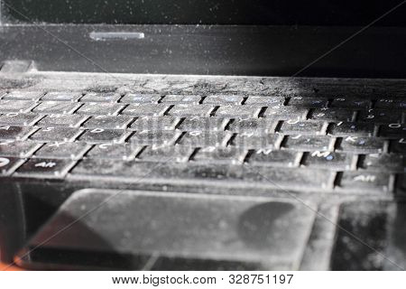Dusty Laptop Keyboard Close-up, Concept Of Lack Of Work, Bad Mood.