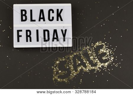 Black Friday Sale Text On White Lightbox, Golden Stars Around With Inscription Discounts On Black Ba