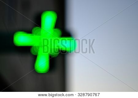 Artistic Image Made Of Pharmacy Green Cross Bokehlicious Circles