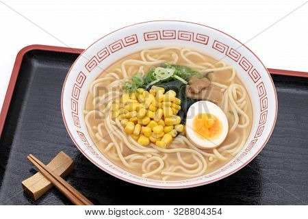 Japanese Miso Ramen Noodles With Chopsticks On Black Tray