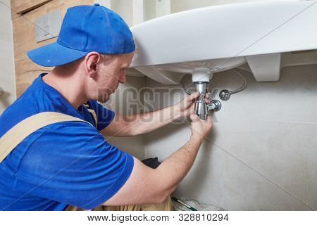 plumber service. wash basin siphon installation