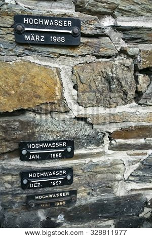 Water Marks Show Past Floods On Stone Wall In St. Goar In Germany