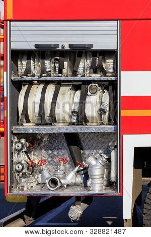 Fire Hoses, Valves And Cranes Are Located In The Cargo Compartment Of An Equipped Fire Truck.
