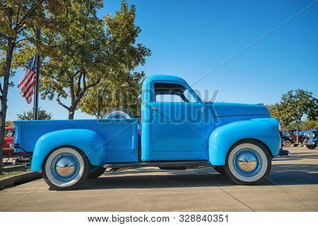 Westlake, Texas - October 19, 2019: Full Side View Of A Light Blue Color Vintage Studebaker Pickup T