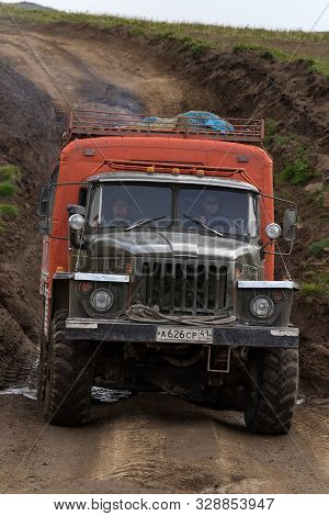 Off-road Extreme Expedition Truck Ural Driving On Mountain Road, Transportation Travelers In Directi