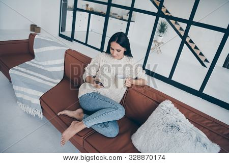 Top High Above Angle Photo Of Concentrated Girl Sit On Brown Leather Divan Use Phone Read Feednews P