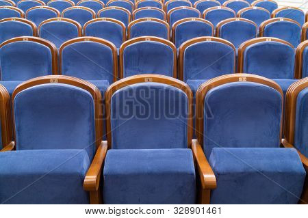 Blue Plush Chairs In The Auditorium Of The Theater. The Interiors Of The Concert Hall.