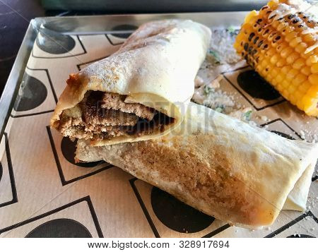 Shawarma Kebab With Beef Tenderloin Slices, Muhammara And Corn At Fast Food Restaurant With Tray.