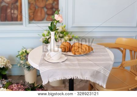Tasty Breakfast Cup Of Coffee With Croissants Near Bakery In Morning. Continental Traditional Breakf
