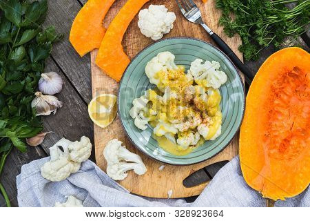 Steamed Cauliflower With Vegan Cheese Sauce And Pumpkin