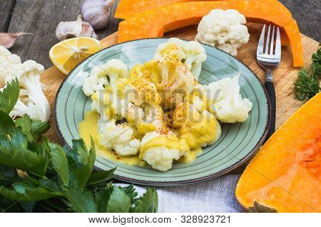Steamed Cauliflower With Vegan Cheese Sauce And Pumpkin