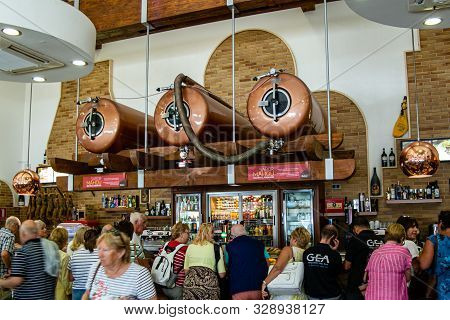 Valenciana, Spain - Oct 17 2019 : View Of Pressurised Beer Tanks High Up Above Bar In Roadside Cafe 